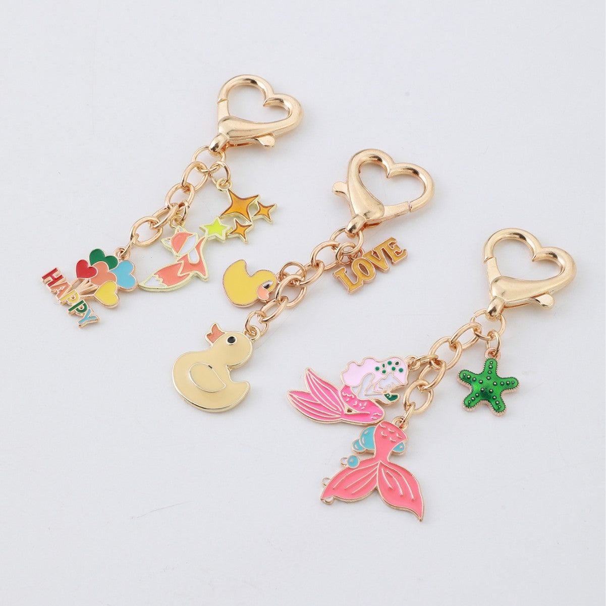 Wholesale Heart duck mermaid metal keychain